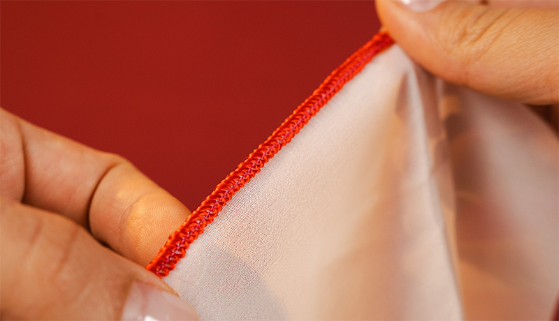 Decorative rolled hem created with Merrylock MK480 overlocker