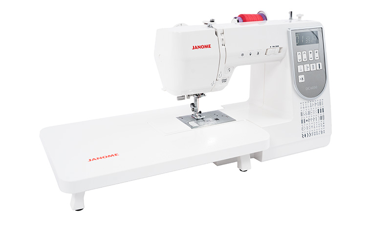 Janome DC6050 fitted with its included extra-wide extension table