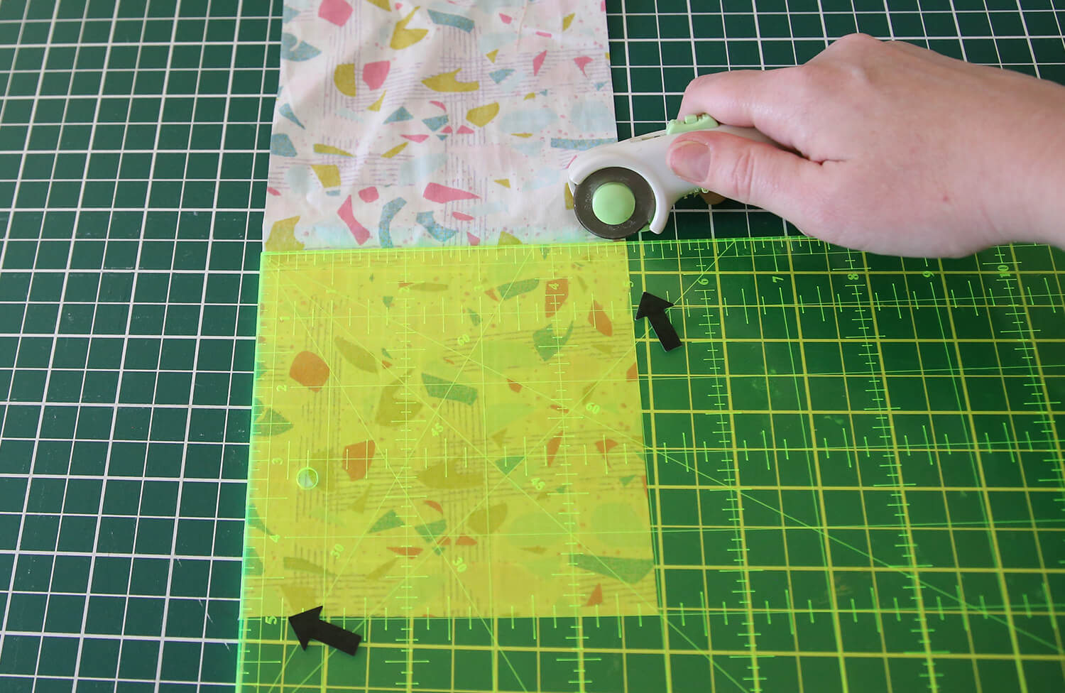 Cutting applique cotton fabric to size using a rotary cutter and ruler